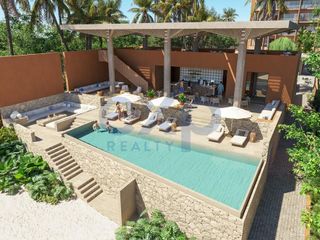 Se vende departamento en preventa 092026 en piso 8 de condominio con frente de playa y  vistas al mar en Punta Sam ubicada entre el Norte de Cancn y Costa Mujeres.