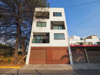 Edificio de 3 departamentos en venta en Momoxpan, Puebla, completamente equipados.