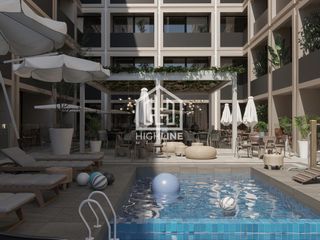 ESTUDIO TIPO SUITE EN VENTA EN EL CENTRO DE PLAYA DEL CARMEN, ALBERCA, CINE, ROOFTOP.