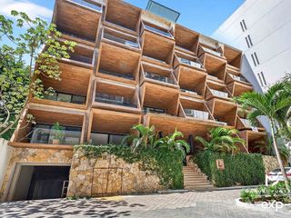 L Condos 9 – One Bedroom with Private Garden