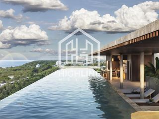 En venta departamento de 2 habitaciones en Playa del Carmen con piscina infinita y gimnasio