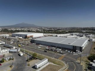 Bodega Industrial en Cuautlancingo, Puebla de 5,574 m2 con área de oficina y altura de 9 m.
