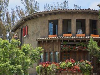 Venta en Val'Quirico, donde la arquitectura abraza la naturaleza circundante.
