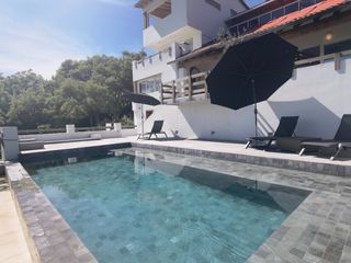 Casa VILLA DOLCEZZA con enorme jardín, vistas expectaculares, alberca climatizada con un bonito estilo único en su tipo en Fracc Rancho San Diego en Ixtapan de la Sal EDOMEX