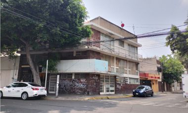 EDIFICIO CON BODEGA , LOCALES  Y DEPARTAMENTOS PARA REMODELAR.