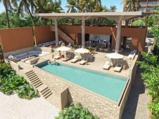 Condominio con Club de playa frente al mar, Alberca, Spa, y business Center, en  Costa mujeres, Cancun.
