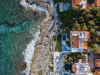 Increíble casa frente al mar Caribe en Puerto Aventuras