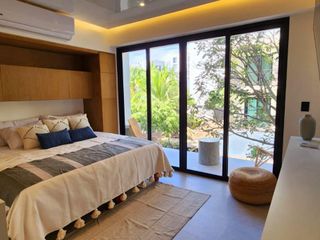 Departamento en condo-hotel en venta en Playa del Carmen en quinta avenida con acabados de lujo