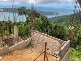 TERRENO CON CONSTRUCCIÓN EN LA CIMA