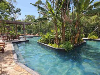 RENTA DE HERMOSO DEPTO CON ROOF GARDEN PRIVADO, TOTALMENTE AMUEBLADO Y PANELES SOLARES, EN TULUM