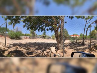 Lote de uso mixto cercado, cerca del aeropuerto, en venta