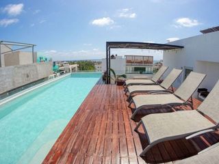 Departamento amueblado cerca del mar con alberca en venta